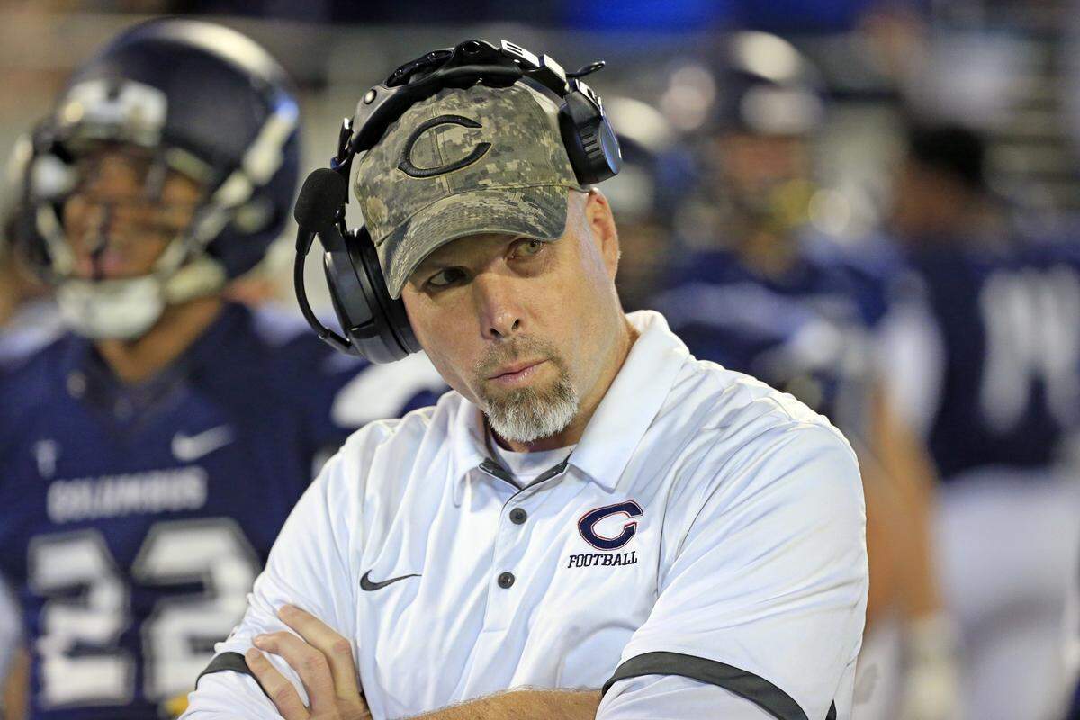 Columbus head coach Chris Merritt on the sidelines as Columbus Explorers play against the Mandarin Mustangs during the Florida High School Athletic Association State Championship Class 8A Saturday, Dec. 8, 2018, at Camping World Stadium in Orlando.
