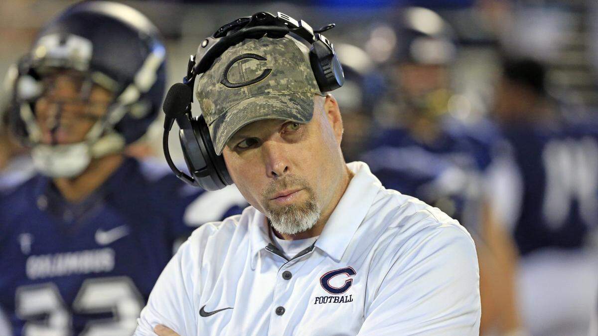 Columbus head coach Chris Merritt on the sidelines as Columbus Explorers play against the Mandarin Mustangs during the Florida High School Athletic Association State Championship Class 8A Saturday, Dec. 8, 2018, at Camping World Stadium in Orlando.
