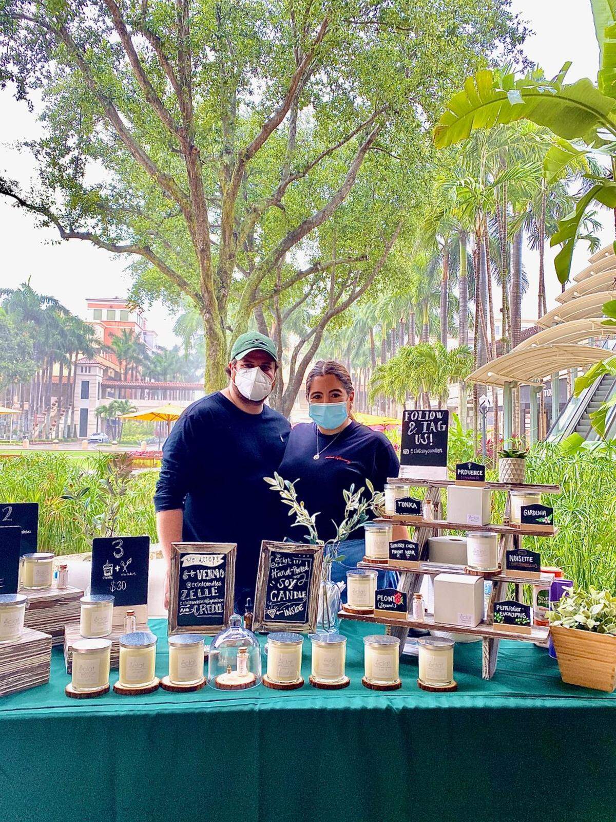 Joel and Tere Ceballos, owners of Éclat Soy Candles, created a new way for customers to smell their candle scents at the reopened Sunday Farmers Market at Shops of Merrick Park.