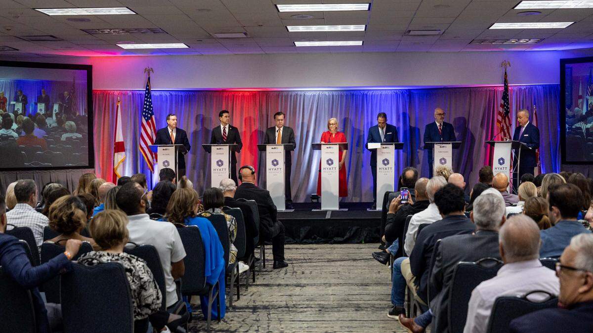 CBS News Miami anchor Eliott Rodriguez moderates a debate for candidates for the new Miami Mayor hosted by the Downtown Neighbors Alliance at Hyatt Regency Miami on Tuesday, September 30, 2025, in Miami, Fla. Those in attendance included Miami Commissioner Joe Carollo, former Miami Commissioner Ken Russell, former Miami Commissioner Alex Díaz de la Portilla, Miami-Dade Commissioner Eileen Higgins, former Miami Mayor Xavier Suarez and former City of Miami Manager Emilio T. Gonzalez.
