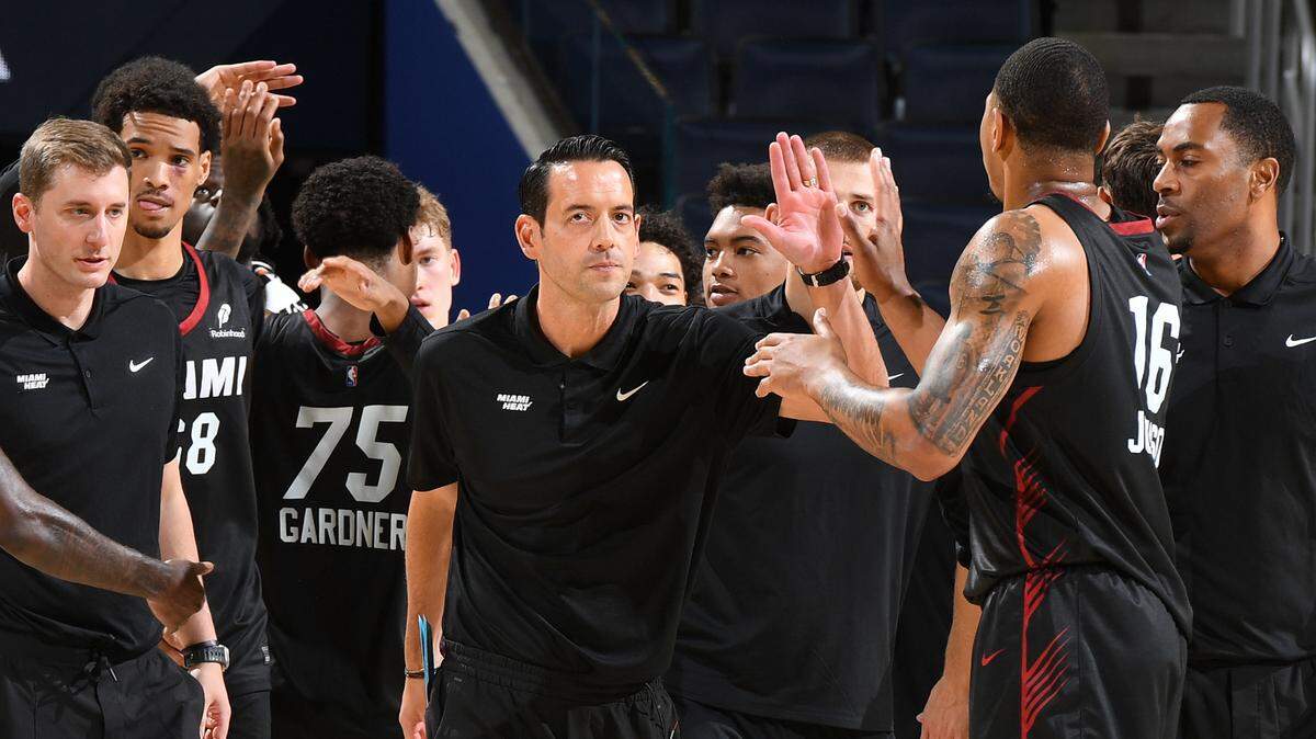 Miami Heat assistant coach Eric Glass (center) is serving as the summer league head coach for the third time in the last eight years.