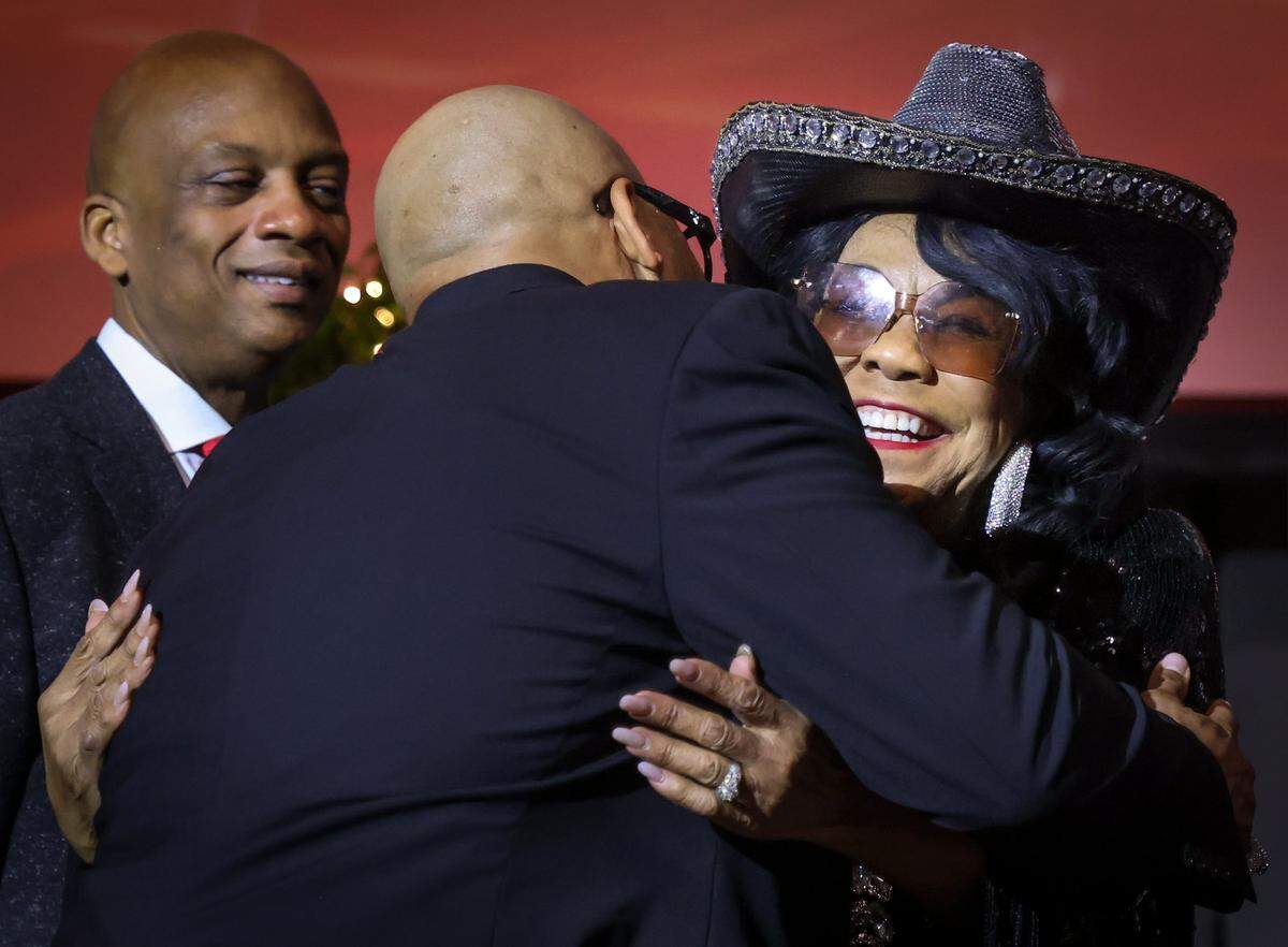 5000 Role Models founder Congresswoman Frederica S. Wilson, right, greets Tramer Lacel “Flo Ride” Dillard, center, prior to being honored as 5000 Role Model of Excellence 2026 Headliner as toastmaster Miami-Dade Commissioner Oliver G. Gilbert III, left, looks on. The 5000 Role Models held its 33rd Annual Dr. Martin Luther King, Jr. Annual Scholarship Breakfast with Keynote Speaker Bishop Neil C. Ellis, and the 2026 Headliners consisting of Lee “Freezy Prince” Prince, Tramar “Flo Rida” Lacel Dillard, Maurice “Trick Daddy” Samuel Young, and Khaled “ DJ Khaled” Mohammed Khaled, on Monday, January 19, 2026, at the Miami Beach Convention Center, in Miami Beach, Florida. 