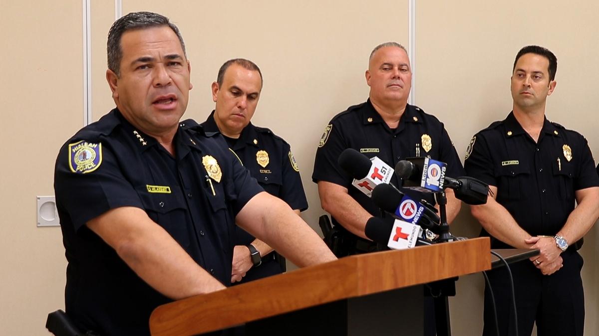 Former Hialeah Police Chief Sergio Velazquez, far left, has asked the court to dismiss public corruption charges against him, two weeks after he was arrested on grand theft and money laundering charges.