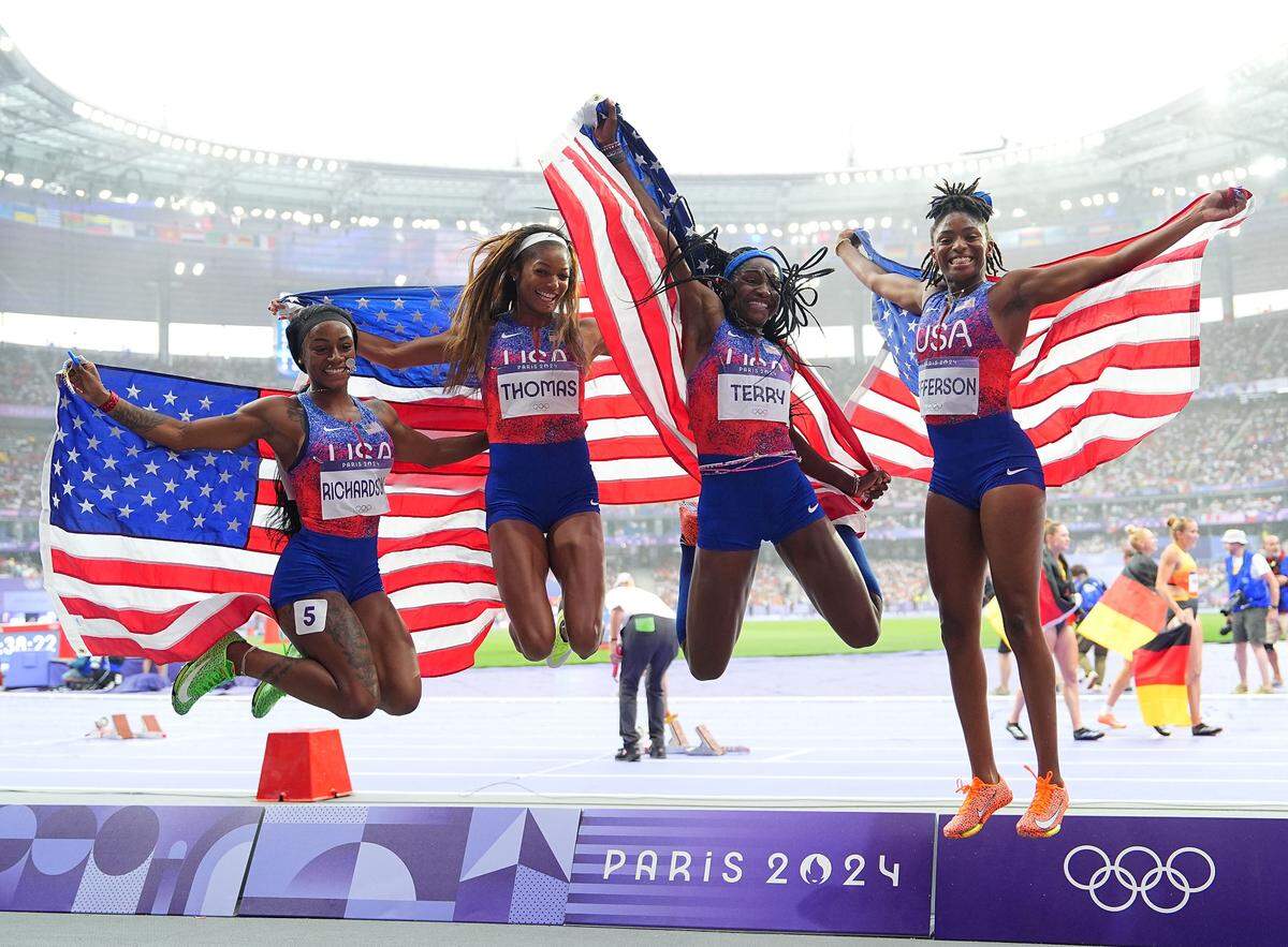 From left: Sha’carri Richardson, Gabrielle Thomas, Twanisha Terry, and Melissa Jefferson of Team USA celebrates after winning the gold medal in the women’s 4X100M relay final at the Paris 2024 Olympic Games, Aug. 9, 2024. 
