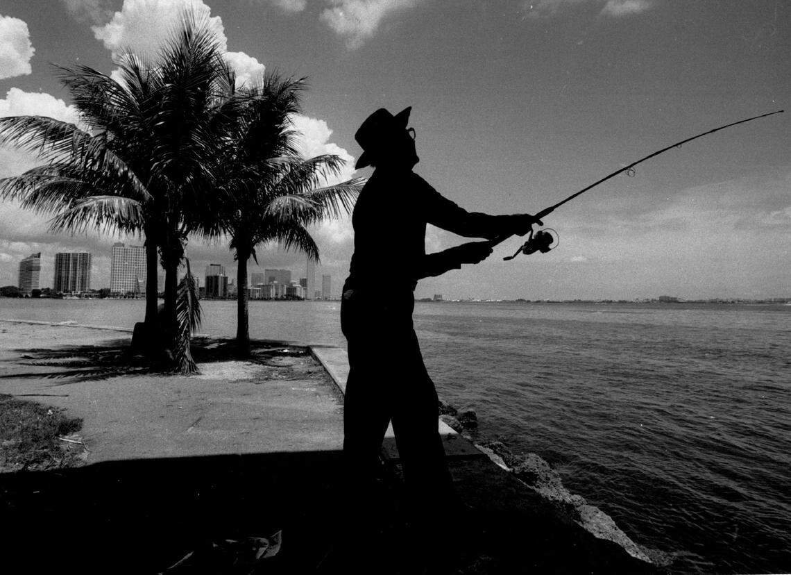 A fisherman at the base of the Rickenbacker Causeway in 1989.