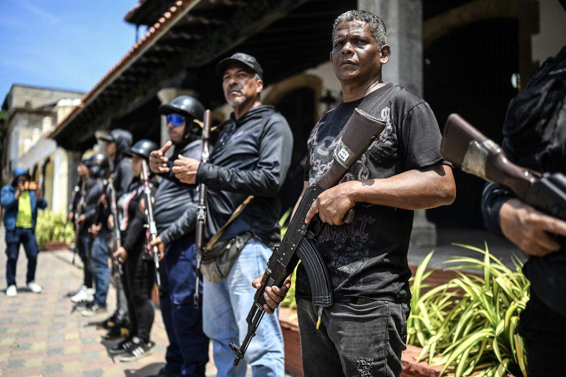 Members of the Bolivarian National Militia take part in military training in La Guaira, Venezuela, on Oct. 8, 2025. 