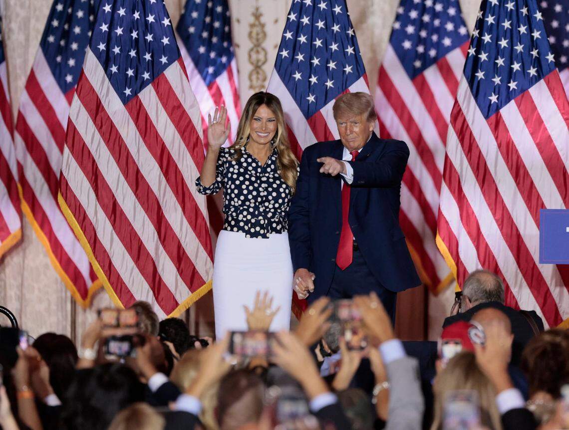 Former President Donald Trump and Former first lady Melania Trump react to the crowd after Trump announces his bid for the US Presidency from his Mar-a-Lago club in Palm Beach, Florida on Tuesday, November 15, 2022.