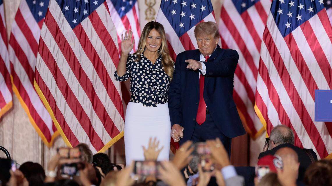 Former President Donald Trump and Former first lady Melania Trump react to the crowd after Trump announces his bid for the US Presidency from his Mar-a-Lago club in Palm Beach, Florida on Tuesday, November 15, 2022.