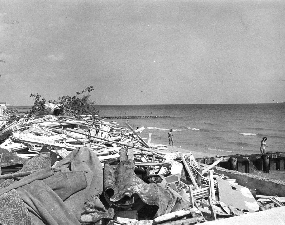 Leftover Betsy Three months after Hurricane Betsy, trash and debris is piled high in Miami Beach near hotels at 36th Street.