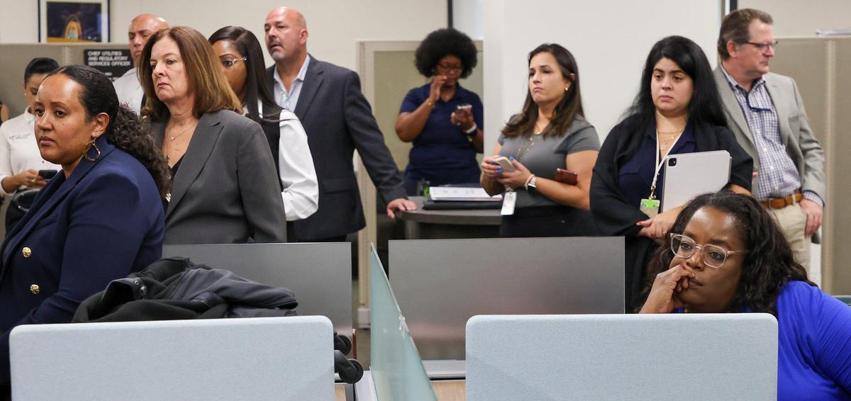 County government employees and staff members listen as Mayor Daniella Levine Cava unveiled her 2026 budget proposal, which includes spending cuts to close a projected deficit of more than $400 million, on Tuesday, July 15, 2025, in Miami.