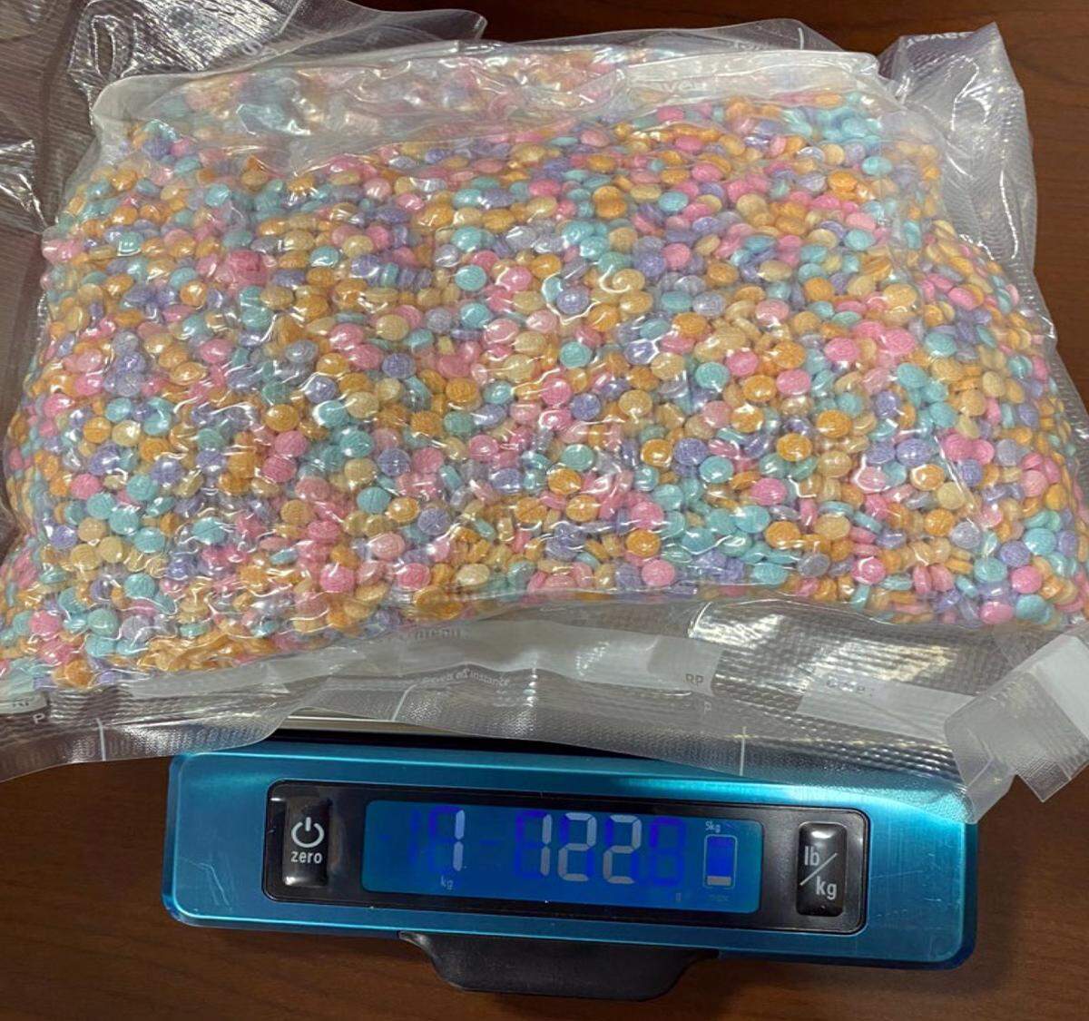 The rainbow-colored fentanyl pills seized by federal agents in the arrest of Fidel Felix-Ochoa, a leader in the Mexican Sinaloa Cartel, according to court records.