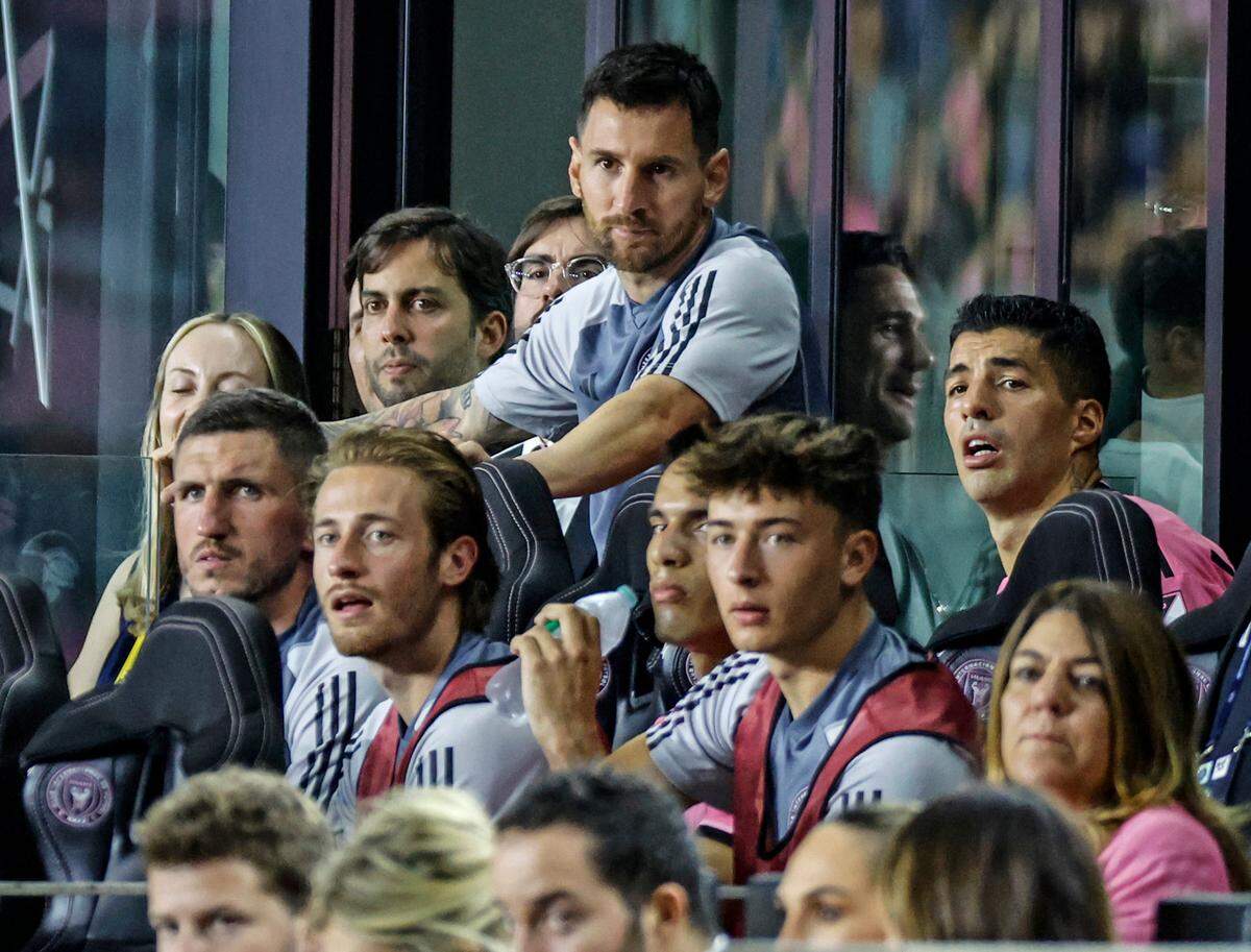 Inter Miami forward Lionel Messi (10) sits on the bench with teammates in the second half of a CONCACAF Champions Cup match against the Nashville SC at Chase Stadium, in Fort Lauderdale on Wednesday, March 13, 2024. He will likely miss the road game at D.C. United Saturday with a hamstring injury.