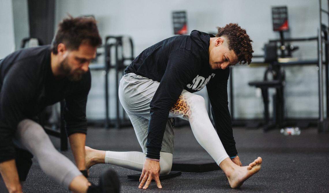 Kansas City Chiefs quarterback Patrick Mahomes works out with longtime personal coach Bobby Stroupe at APEC in Fort Worth last February.