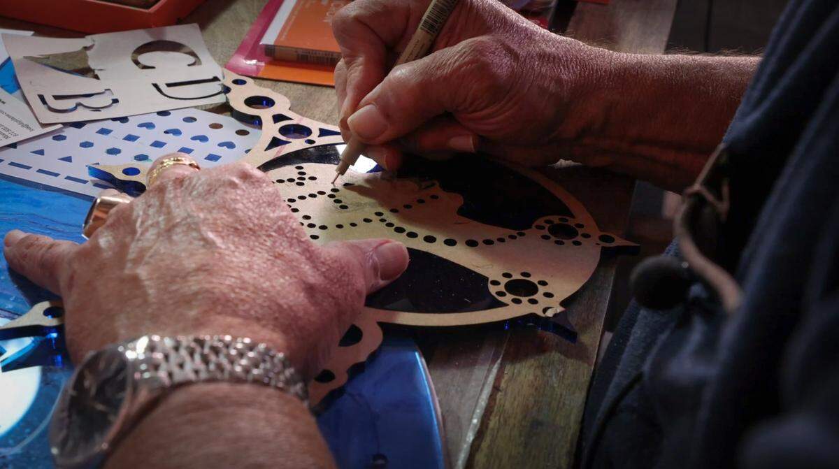 Edouard Duval-Carrié works on small art pieces for supporters of his journey. Edouard Duval-Carrié, a renowned Haitian-born artist based in Miami, rose to prominence after serving as Miami-Dade County's artist-in-residence on November 07, 2024. Known for his vibrant, mixed-media works exploring Caribbean history and culture, Duval-Carrié's innovative vision has earned him international acclaim, culminating in an invitation to exhibit at the prestigious Venice Biennale.