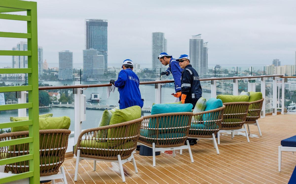 Members of the Deck crew finalized details in the Chill Island deck in the Royal Caribbean’s Icon of the Seas.