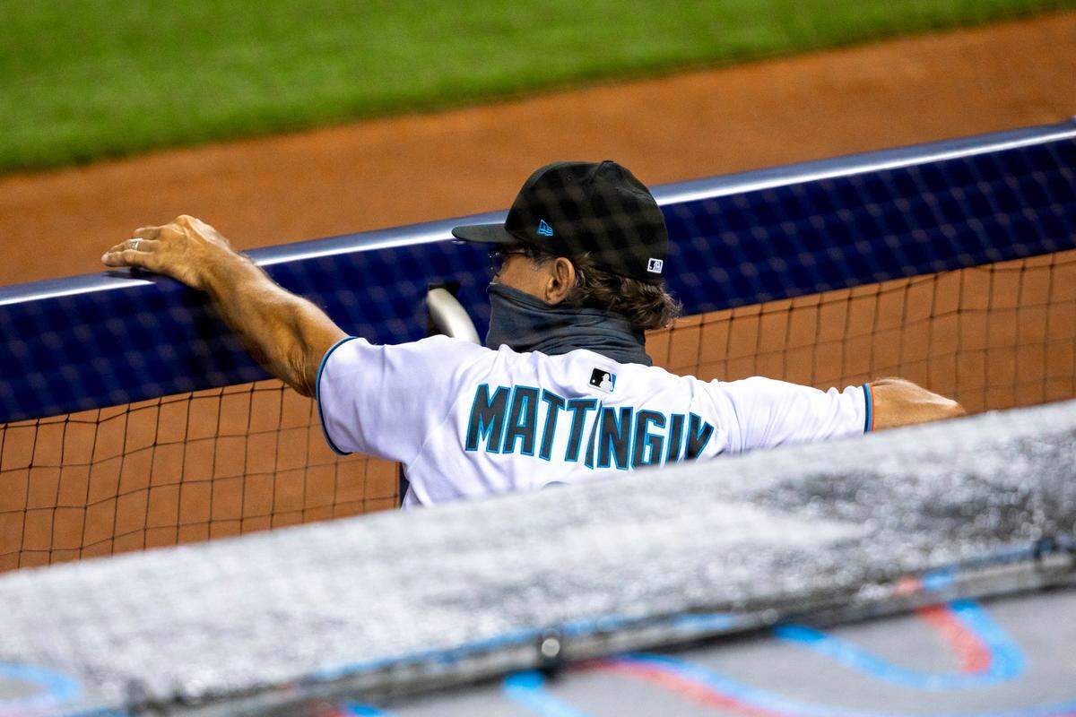 Miami Marlins manager Don Mattingly sits in the Marlins dugout during a Major League Baseball game against the New York Mets at Marlins Park in Miami, Florida on Monday, August 17, 2020.