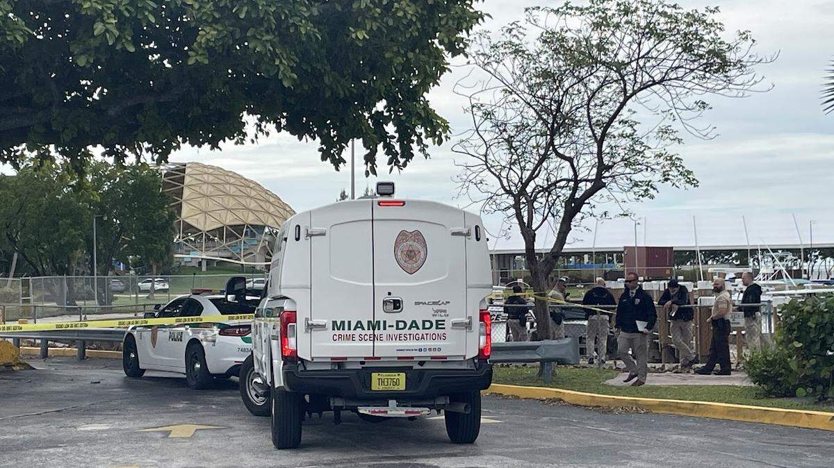 Miami-Dade police crime scene investigations vehicle arrives at a pier near the Miami Seaquarium on Friday, Dec. 22, 2023.