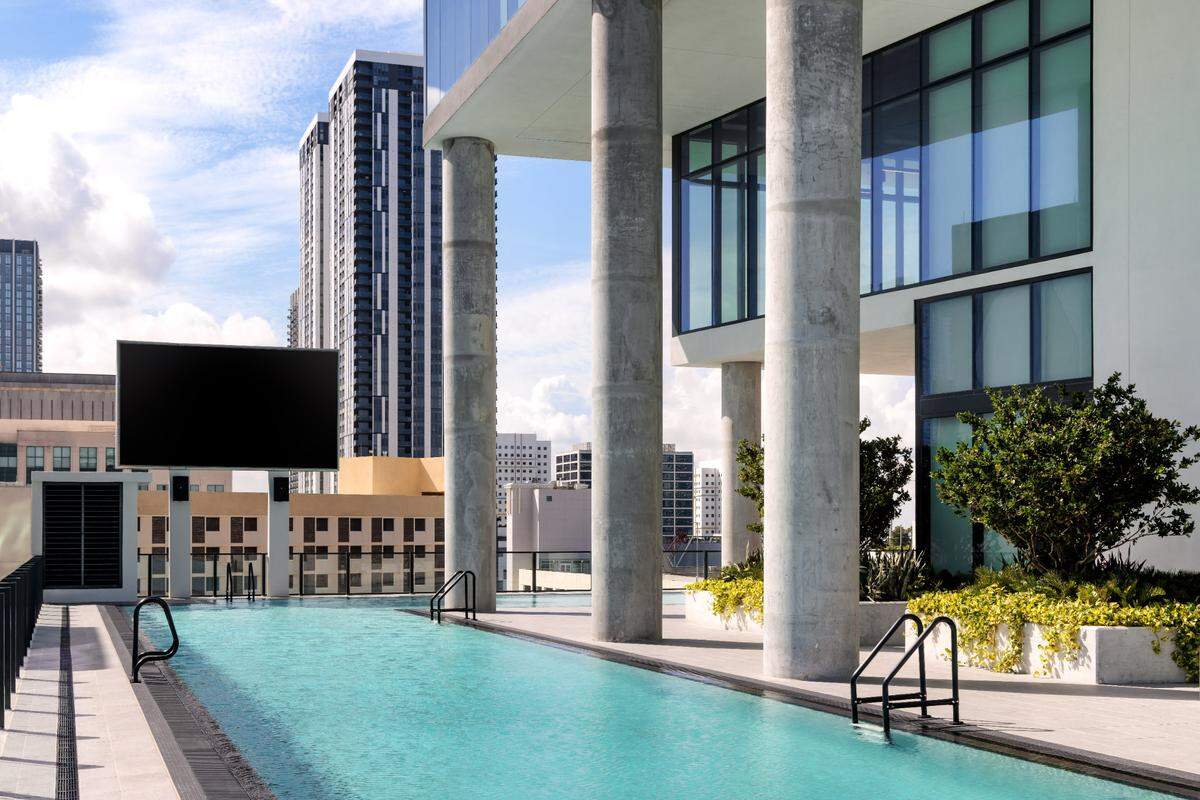 The Elser Hotel & Residences prioritizes sustainability, right down to the reef-friendly sunscreen offered at the pool.