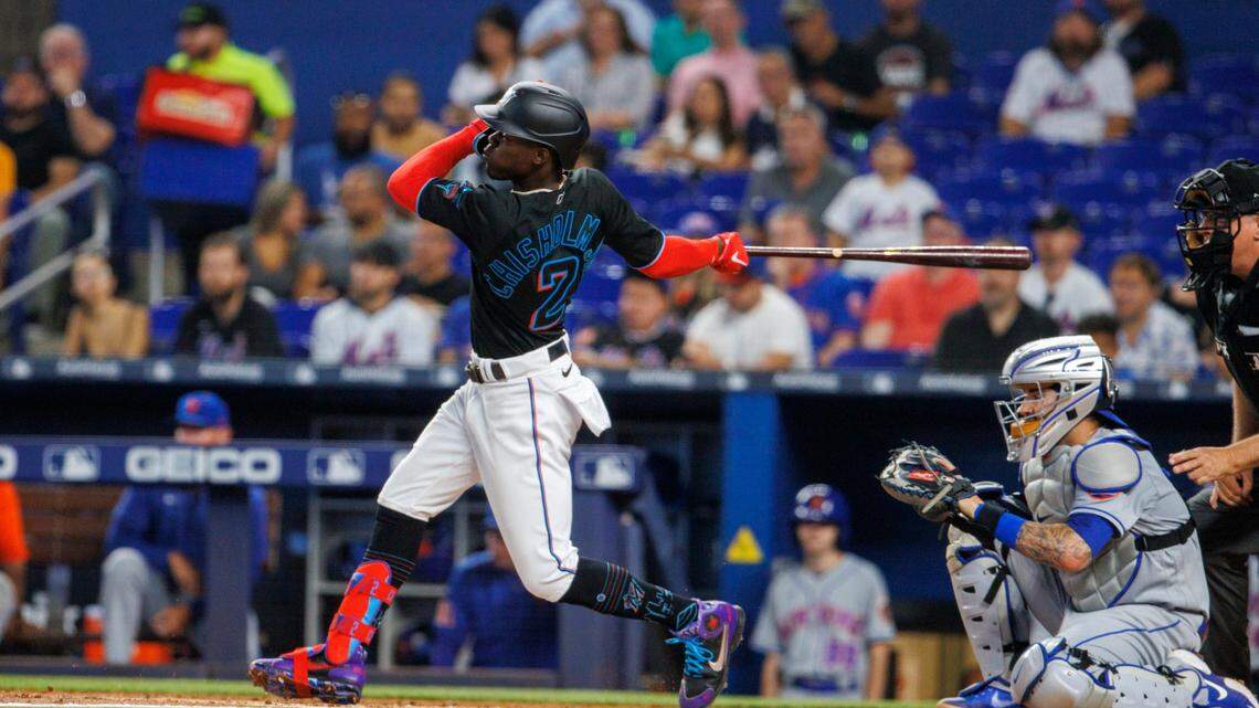 Miami Marlins second baseman Jazz Chisholm Jr. (2) hits a single during the first inning of a baseball game against the New York Mets at LoanDepot Park on Friday, June 24, 2022 in Miami, Florida.