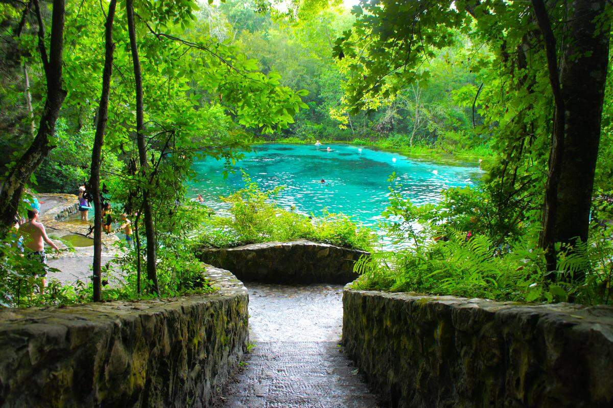 These spring-fed rivers stay a refreshing 72°F all year — perfect for tubing, swimming or just floating your stress away.
