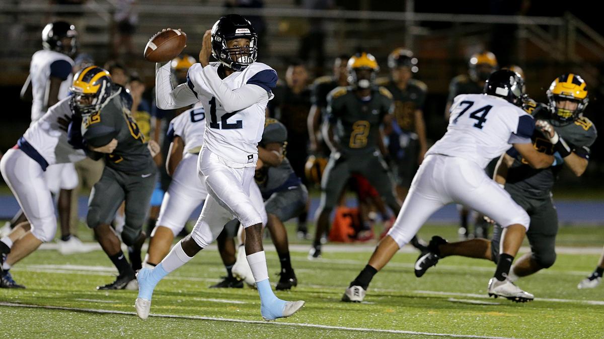Palmetto’s quarterback Cairiq Rackley looks to pass during the first quarter of the Belen Jesuit on Thursday.