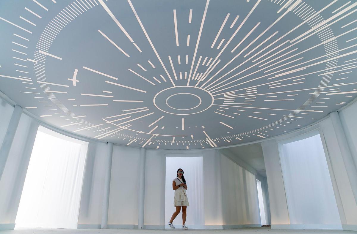 Casey Lesser explores FIVE ECHOES by artist Es Devlin at the Jungle Plaza inside the Miami Design District.