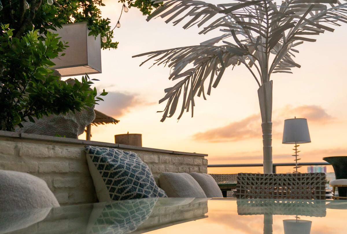 Don’t want to sit on a table? Lounge on a daybed at Salvaje, on the rooftop of Hyde Midtown Miami.