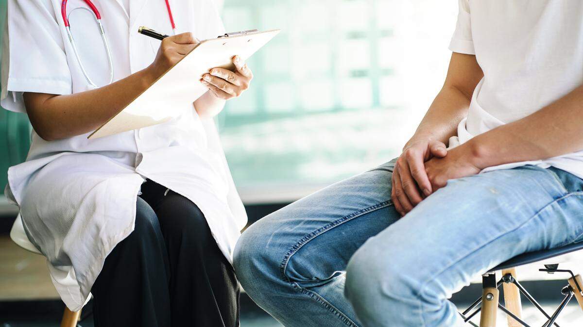 A doctor talks to a patient.