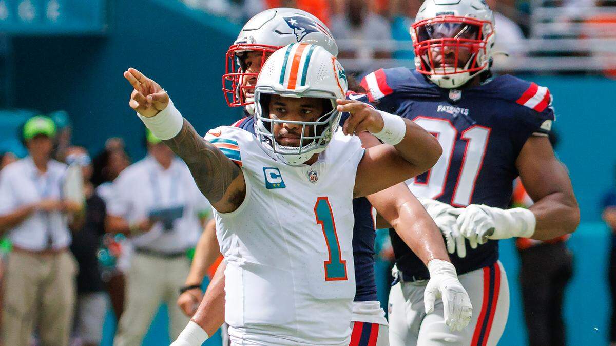 Miami Dolphins quarterback Tua Tagovailoa (1) reacts after running for a first down during second quarter of an NFL football game against the New England Patriots at Hard Rock Stadium on Sunday, Oct. 29, 2023 in Miami Gardens, Fl.
