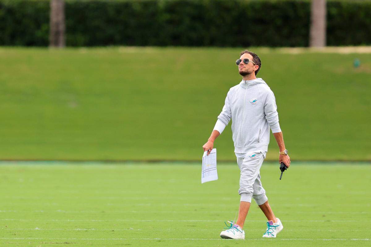 Miami Dolphins head coach Mike McDaniel looks on while walking on the field during practice at Baptist Health Training Complex in Miami Gardens, Florida, Thursday, September 4, 2025.