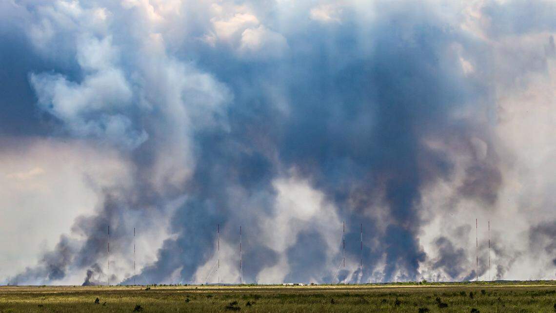 Smoke rises from a large wildfire on the south side of Tamiami Trail on Tuesday, April 28, 2026.