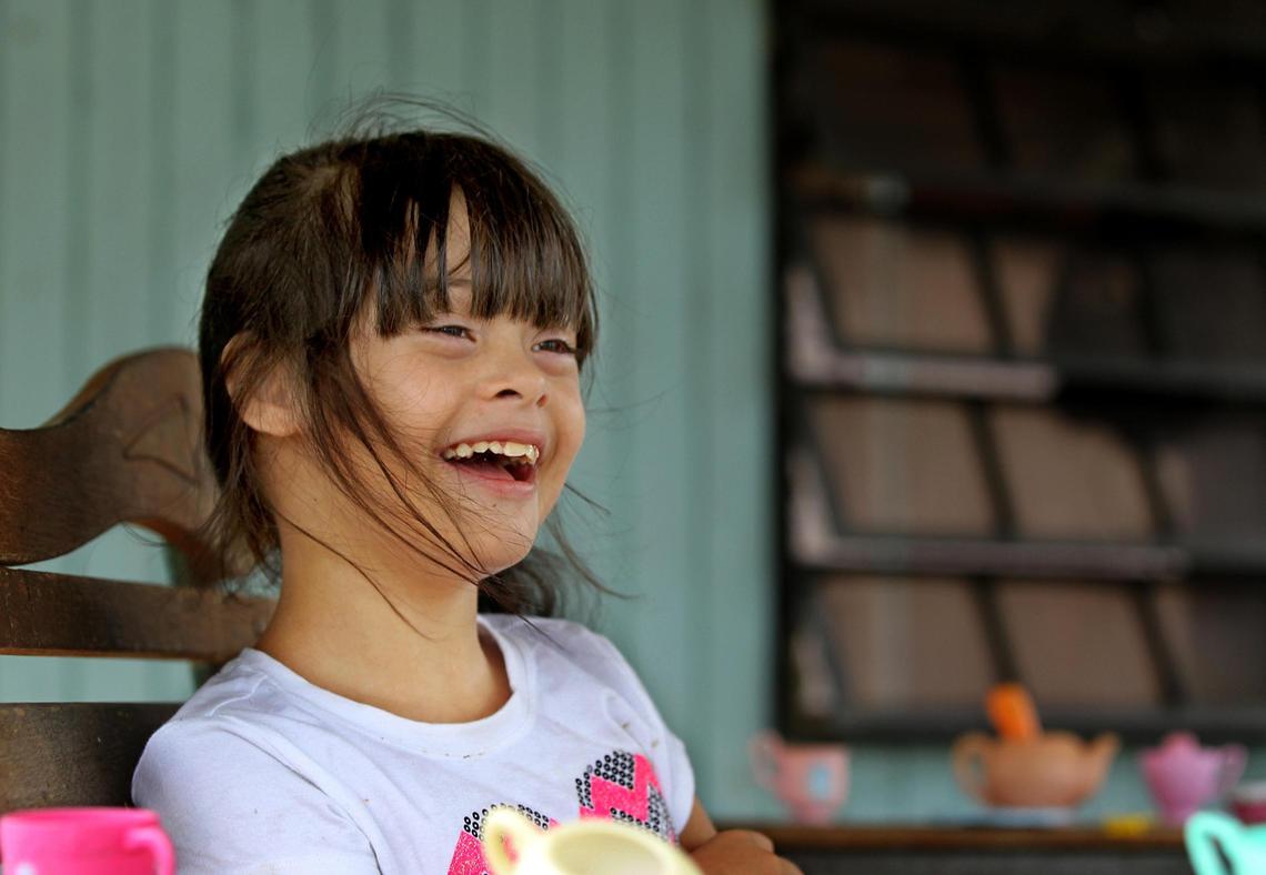 Marylee Colón, 10, has Down syndrome, and her parents are worried about her education after her school closed in Puerto Rico. The school closures affected many students with special needs.