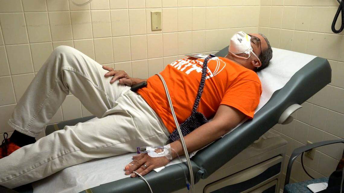 A man gets a monoclonal antibody treatment at Broward Health.