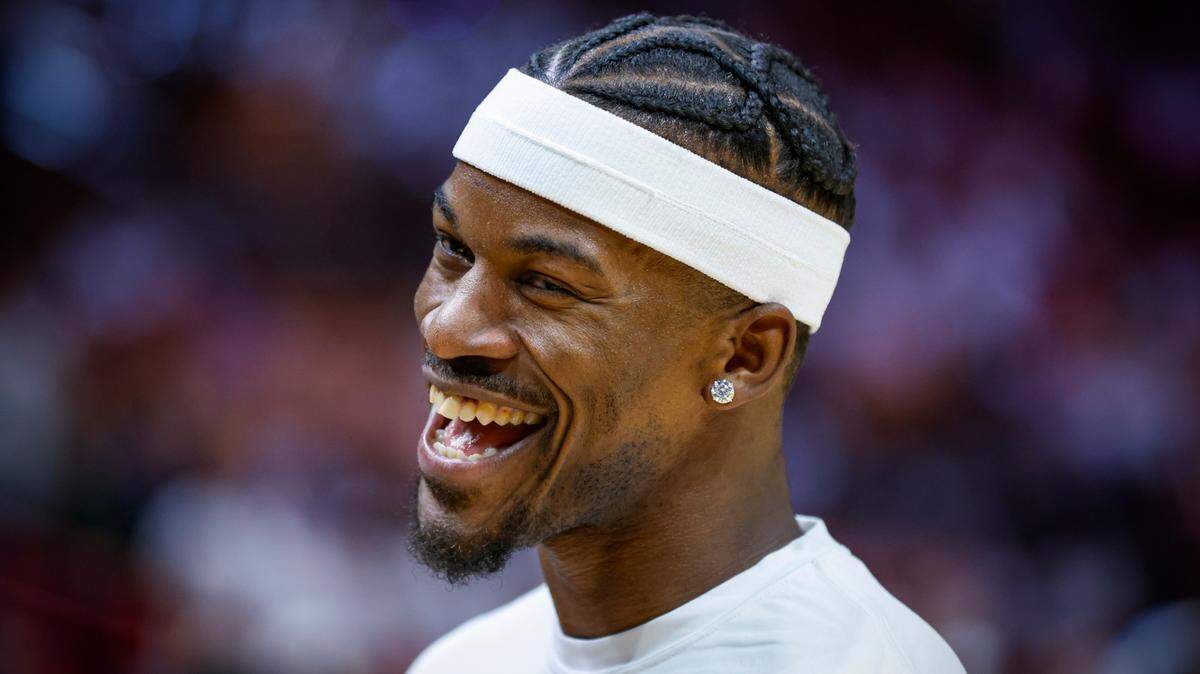 Miami Heat forward Jimmy Butler (22) smiles before the start of the game against the New York Knicks in Game 3 of the NBA Eastern Conference Semifinals at the Kaseya Center in Miami on Saturday, May 6, 2023.