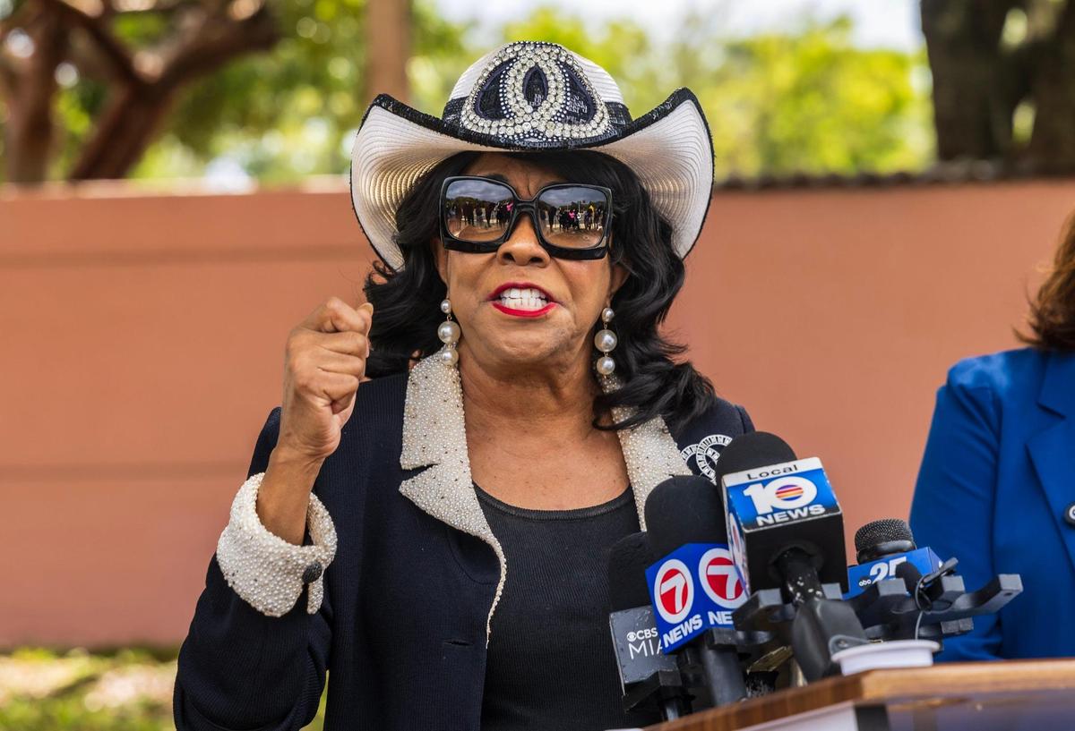 U.S. Rep. Frederica Wilson, of Miami, talks to the media after visiting the Broward Transitional Center following the death last week of a Haitian woman in custody.