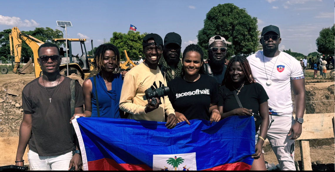 A still shot of director Samuel Dameus with film crew at the site of the Ouanaminthe canal. Dameus shot the film The Heroes of the Massacre River to highlight the unity among Hatians to complete the Canal.