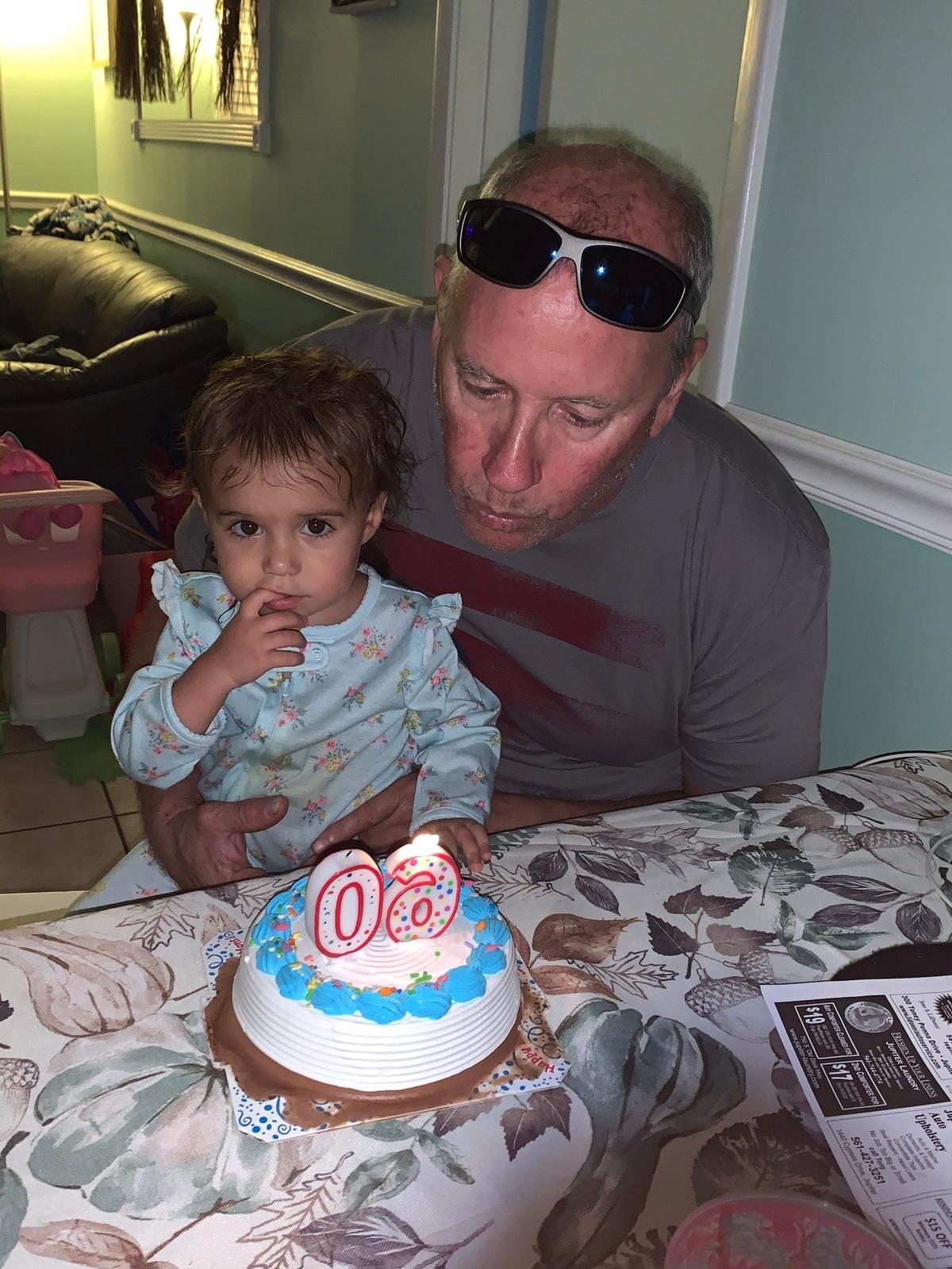 Michael Foy with his granddaughter
