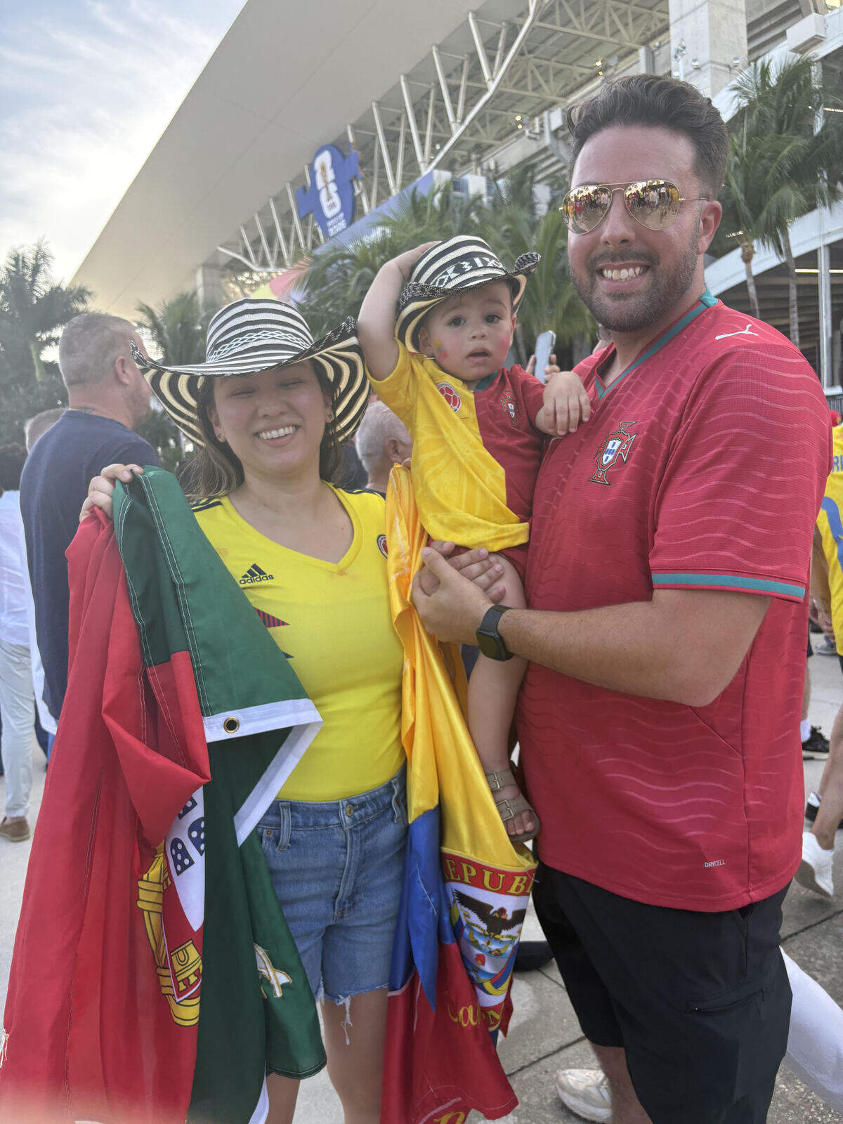 Karen Serras, whose family is Colombian, and Kevin Serras, whose family is Portuguese, brought son Andre, age one, to the Colombia-Portugal match. He’s dressed with his fandom split straight down the middle.