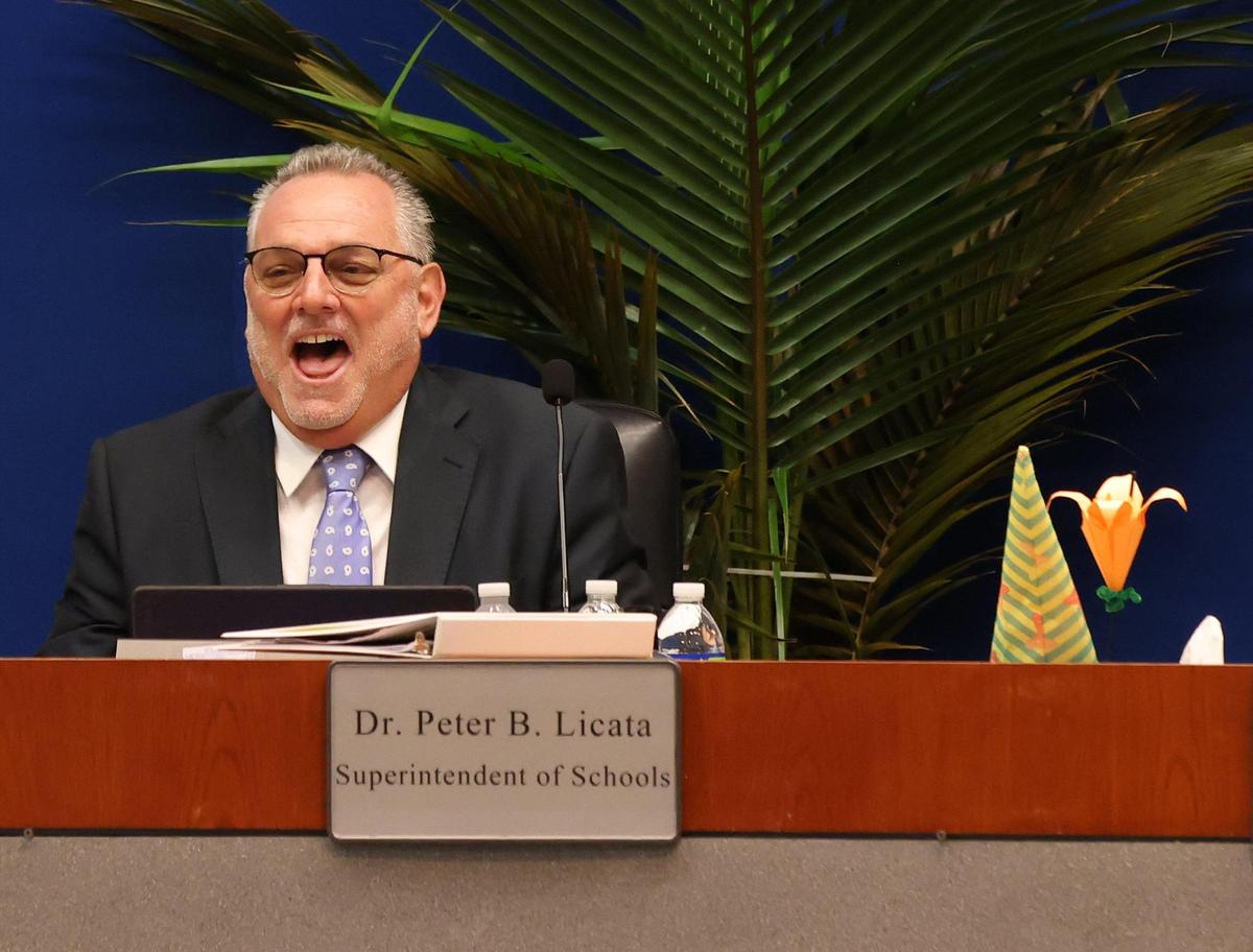 Dr. Peter B. Licata reacts while taking his seat after being sworn in by Judge Elijah H. Williams of the 7th Judicial Circuit as superintendent of Broward County Public Schools at the Kathleen C. Wright Administration Center’s boardroom in Fort Lauderdale, Florida on Tuesday, July 18, 2023. BCPS, the sixth-largest school district in the nation and the second-largest in the state of Florida.
