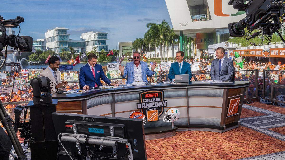 From left- ESPN hosts Desmond Howard, Rece Davis, Pat McAfee, Nick Saban and Kirk Herbstreit seen on the set during the ESPN’s College GameDay, live broadcasting from Coral Gables, where the University of Miami Hurricanes fans gathered to celebrate the Hurricanes ahead of their game against the Florida Gators, on Saturday September 20, 2025.