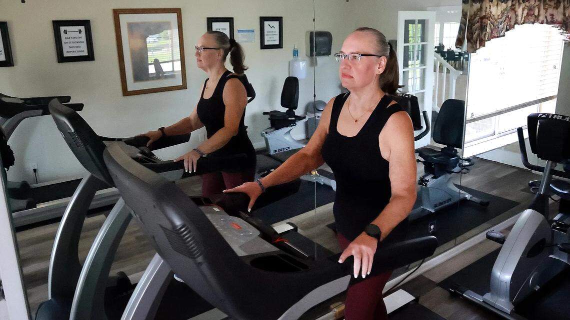 Jennifer Kirtley, of Lake Worth Beach, exercises in her community gym. Kirtley credits the medication Wegovy for helping her lose nearly 200 pounds.