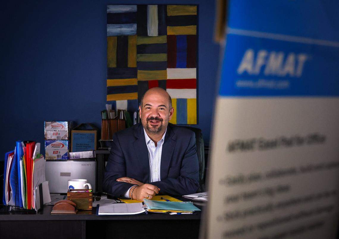 Christian Ulvert at his desk at Edge Communications on Monday, May 6, 2024, in Miami.