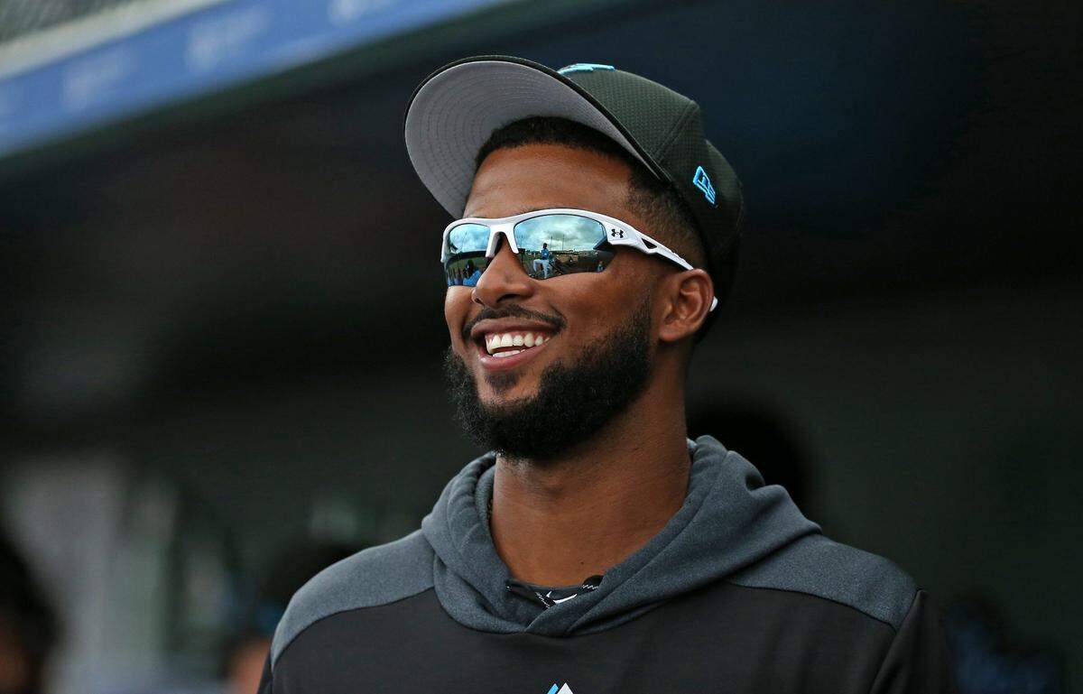Miami Marlins pitcher Sandy Alcantara (22) smiles during the third inning of a Major League Baseball spring training game against the Houston Astros at Roger Dean Chevrolet Stadium on Tuesday, February 26, 2019 in Jupiter, FL .