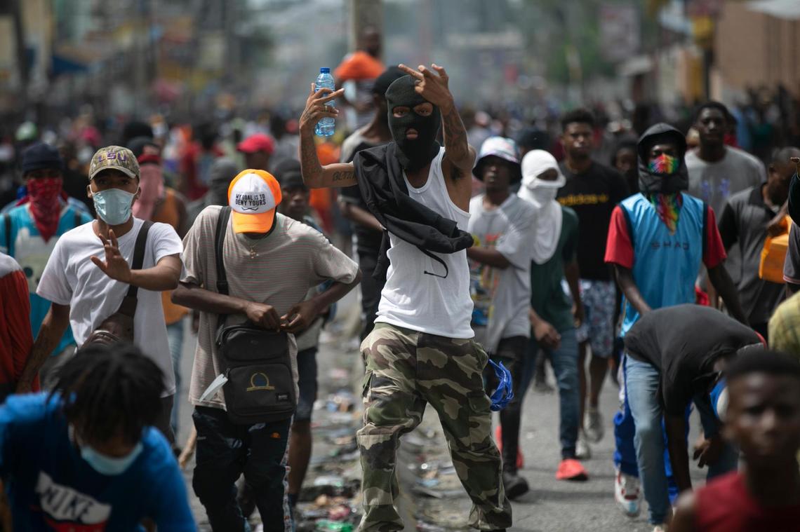 Demonstrators protest against fuel price hikes and to demand that Haitian Prime Minister Ariel Henry step down, in Port-au-Prince, Haiti, Monday, Sept. 19, 2022.