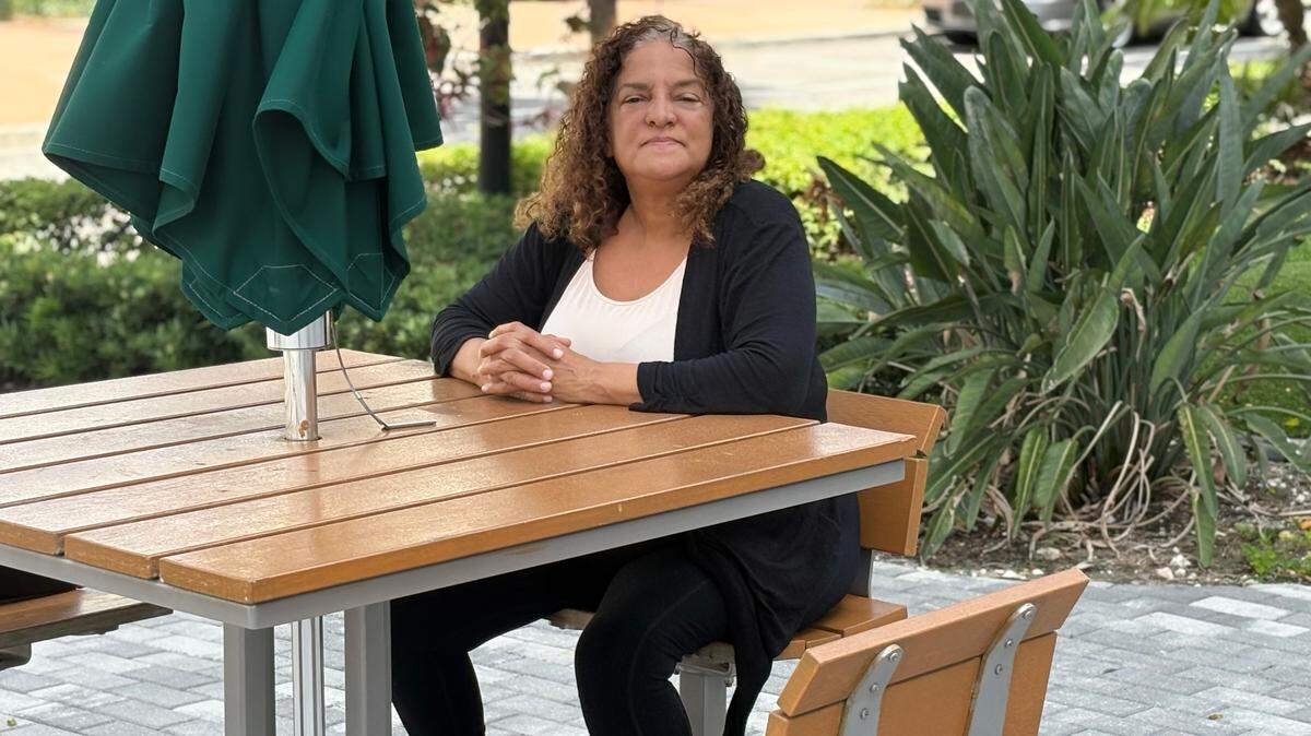 Francoise Cham of Miami has health insurance coverage for herself and her daughter through the Affordable Care Act marketplace, also known as Obamacare. The budget law signed by President Donald Trump on July 4 creates new rules for verifying eligibility for subsidized coverage, shorter enrollment periods, and other changes that will cause about 870,000 Floridians to lose health insurance by 2034.