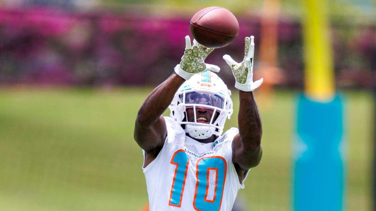 Miami Dolphins wide receiver Tyreek Hill catches a pass during the NFL football team’s organized team activities at Baptist Health Training Complex in Hard Rock Stadium on Tuesday, May 24, 2022 in Miami Gardens, Florida, in preparation for their 2022-23 NFL season.