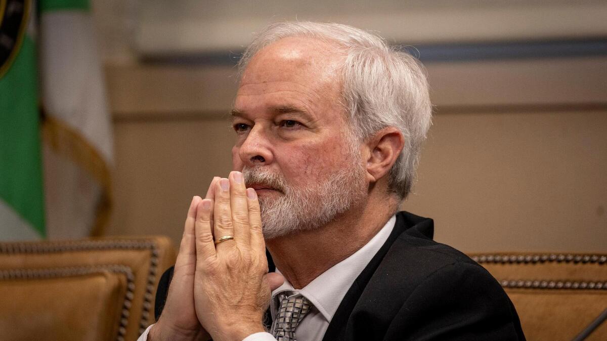 Then-Commissioner Kirk Menendez listens during a Coral Gables City Commission meeting on Feb. 13, 2024.