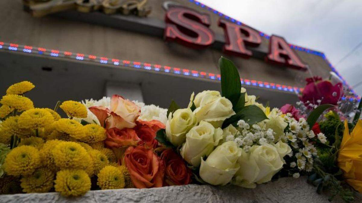 Mourning Atlantans placed flowers at the site of one of the spa shootings.