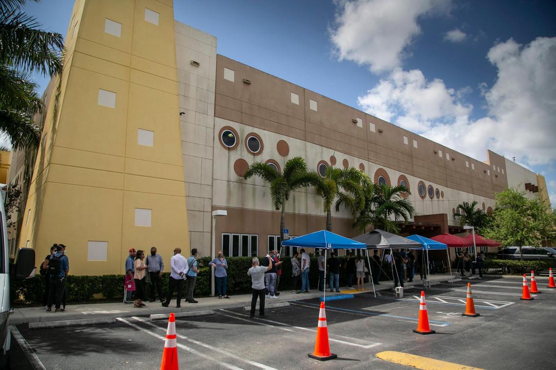 Miami, Florida, March 11, 2021 - People line up to get into the gymnasium at the Miami Springs Community Center, 1401 Westward Drive, Miami Springs. Two new satellite federal vaccination sites opened Thursday. The other one is in North Miami Beach.