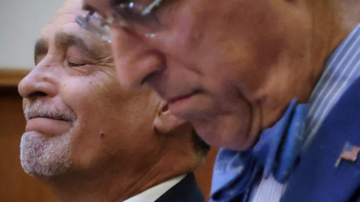 Joe Martinez reacts while standing next to his attorney Ben Kuehne, right, as Judge Miguel de la O stated that he needed more time to rule, on Thursday, August 7, 2025. The judge set a new sentencing date to September 15 after a day of emotional testimony at the Richard E. Gerstein Justice Building in Miami, Florida.